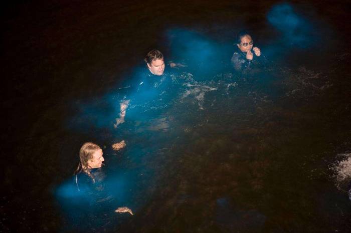 Bioluminescence blue glow Scripps Pier swimming long exposure