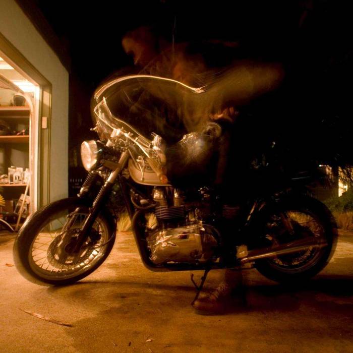 Triumph Bonneville long exposure dismounting night