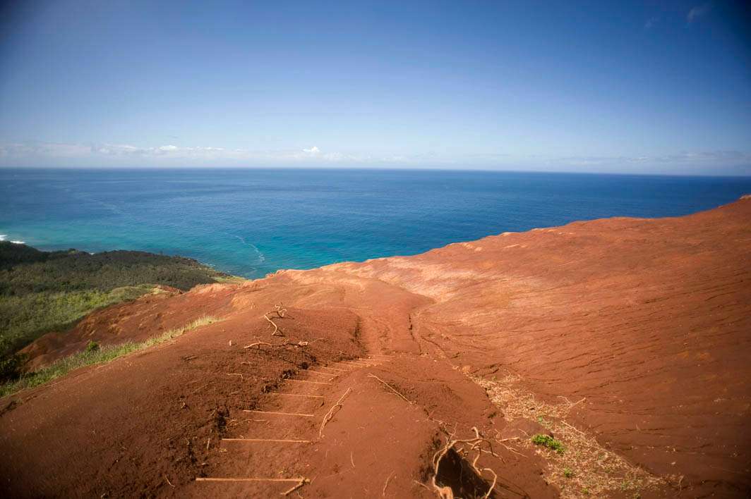 Hawaii Kauai Kalalau trail Napali coast red dirt trail steps