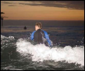 Night surf nightsurf Scripps pier low light sunset
