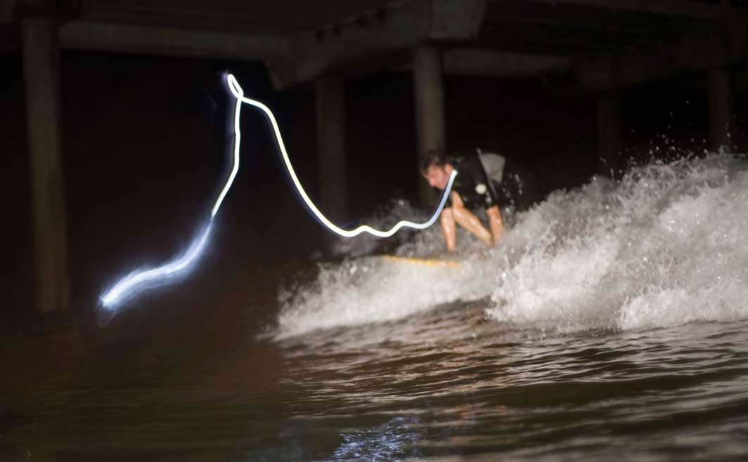 Night surf nightsurf paddle Scripps pier led tentacle