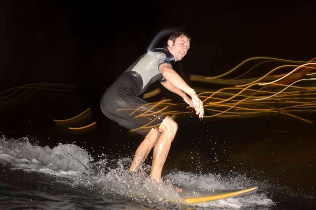 Night surfing surf glow sticks
