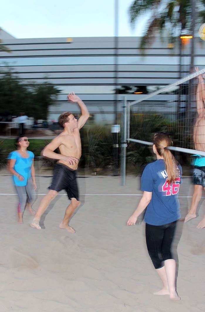 Beach volleyball block motion blur
