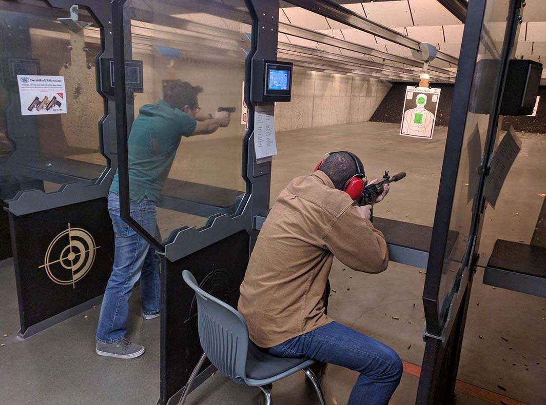Gun range shooting suppressed rifle