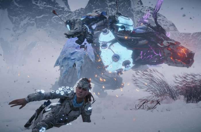 Horizon Zero Dawn DLC screenshot Aloy sliding snow