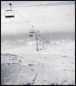 Skiing snowboarding Mount Hood peak lift weather view clouds