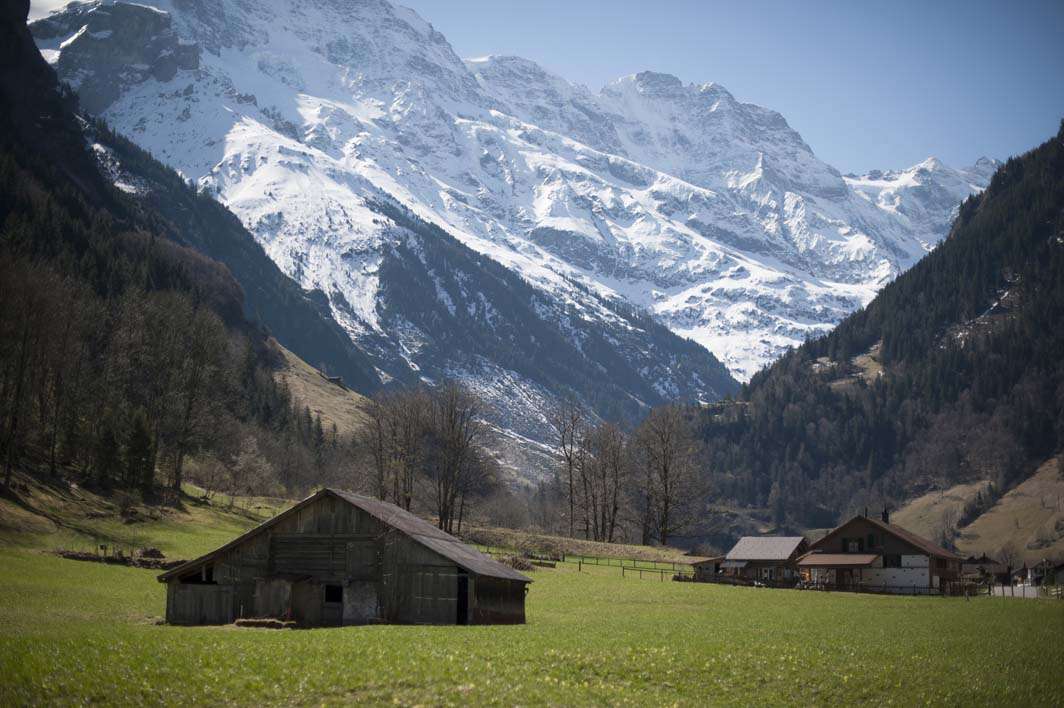 Switzerland travel alps Lauterbrunnen grass barns view
