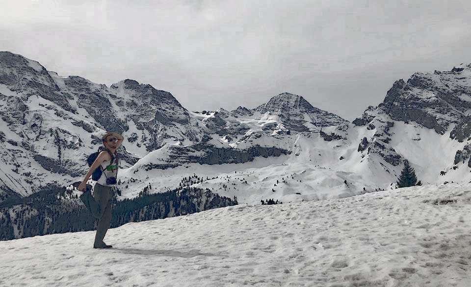 Swiss Alps Murren ski slope hike yoga pose