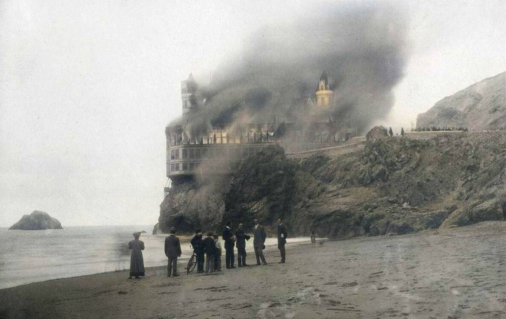 San Franscisco cliff house burning on fire onlookers retouched