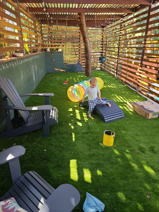 Artificial grass terrace enclosure chairs