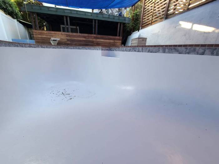 Fiberglass in-ground pool resurface curing