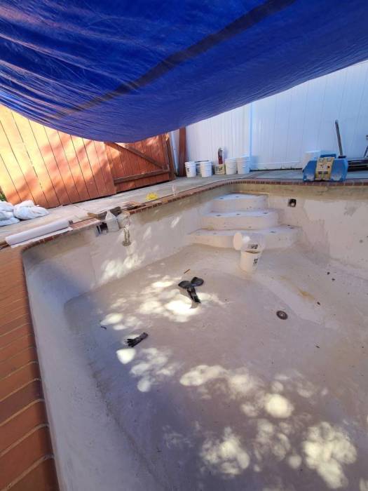 Fiberglass in-ground pool resurface prep returns skimmer