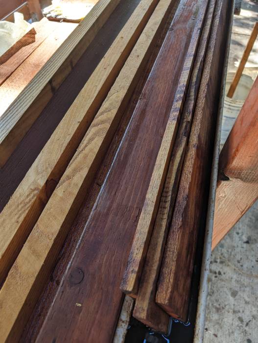 Wood treatment fence plank linseed oil bath rain gutter