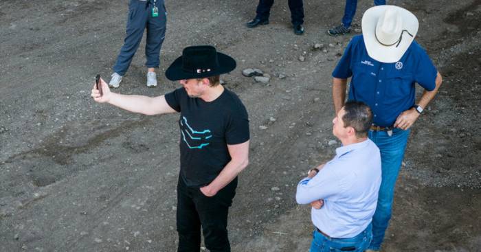 Elon Musk Texas selfie border cowboy hat