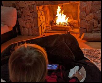 Watching PJ Masks by the fire